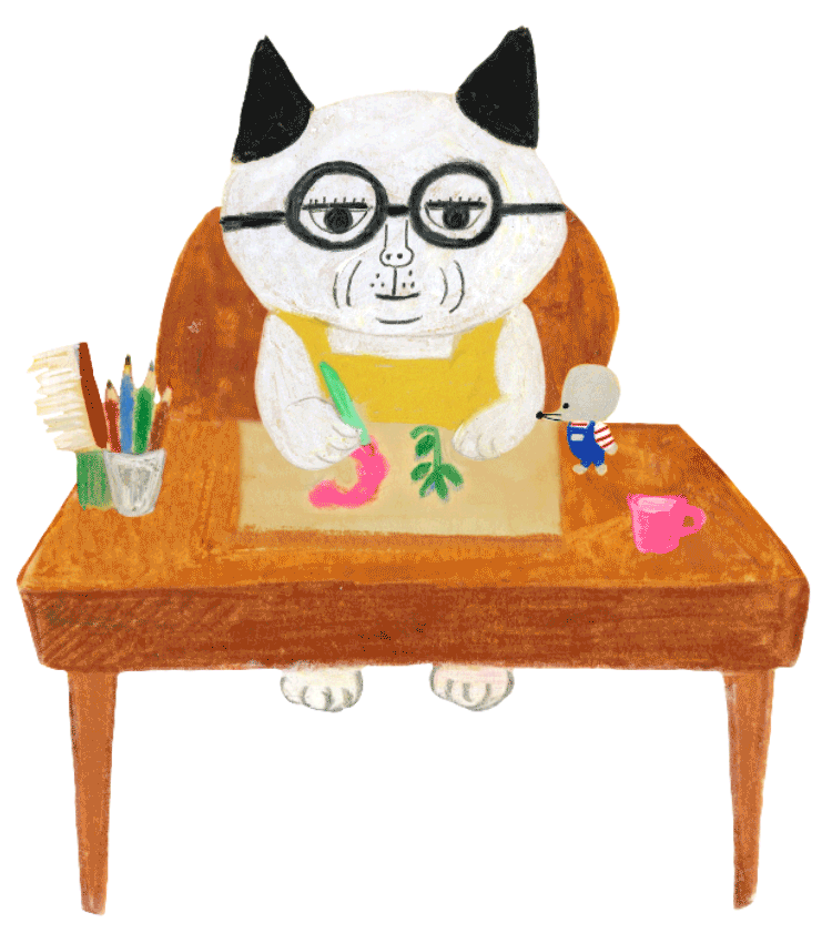 机で作業するめがねこさん